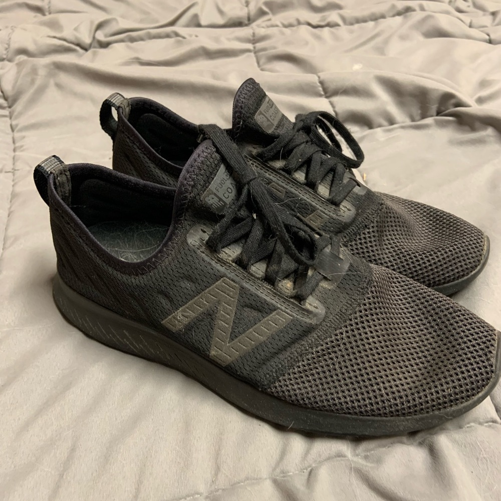 New Balance black sneakers